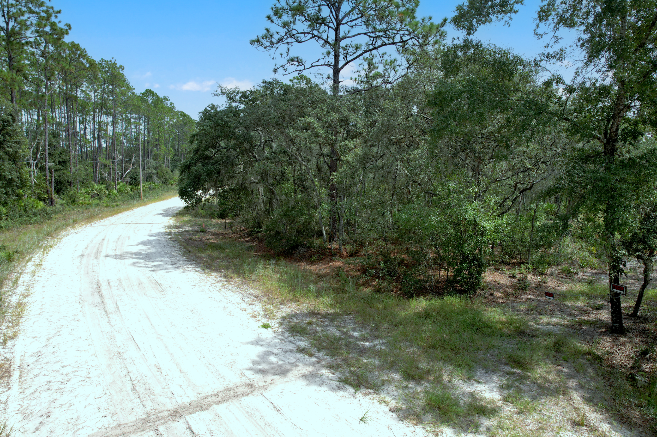 Flip the Script on Inflation: 0.25Ac of Prime FL Land Power, Road, No HOA!