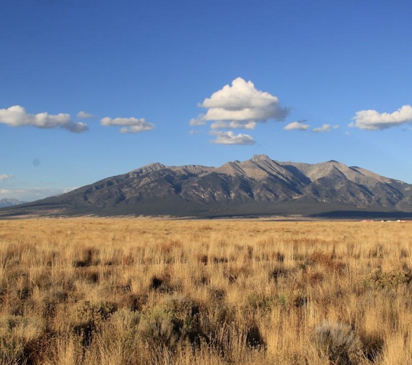 Own 5 acres of undeveloped land in Costilla County
