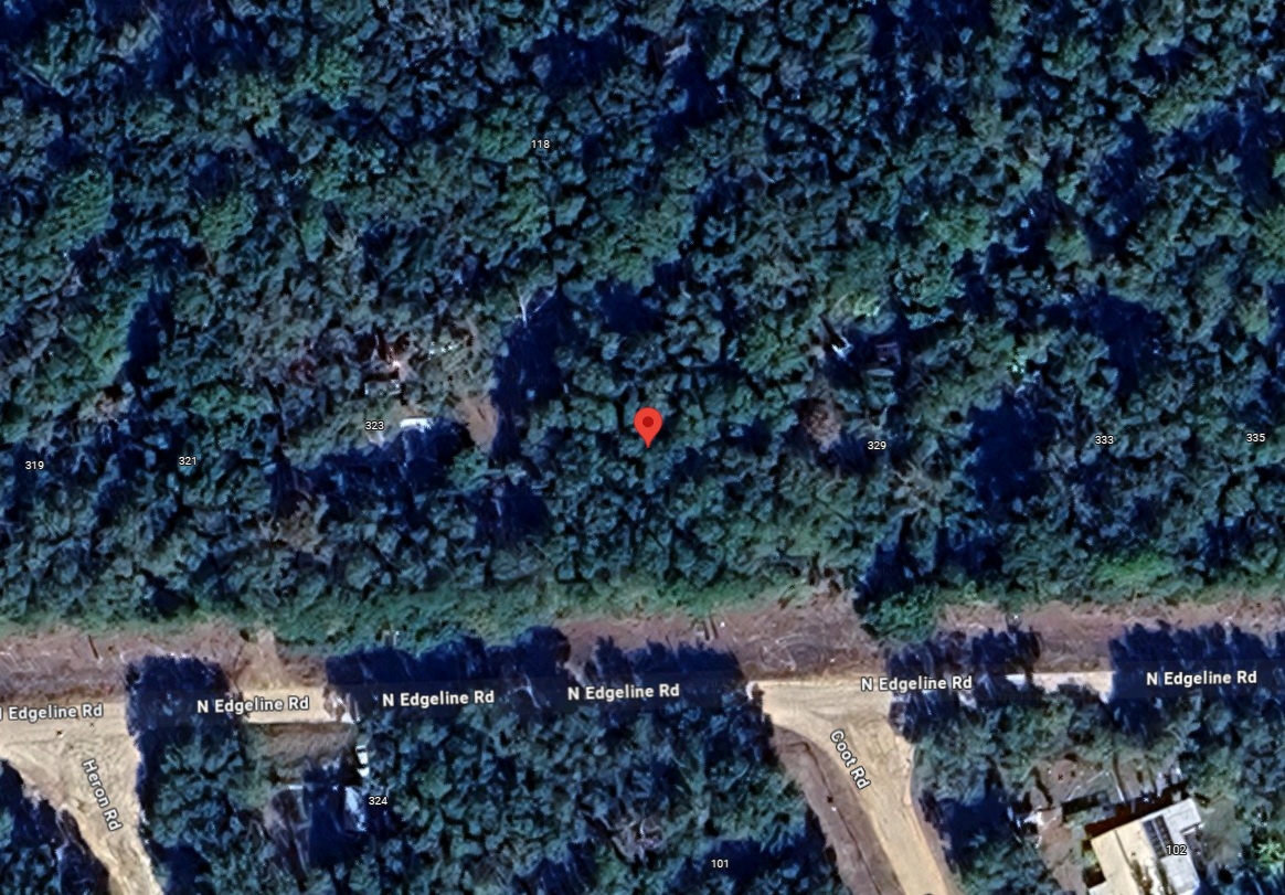 STR Potential! Wooded R-2 Lot w/ Power Near Lakes